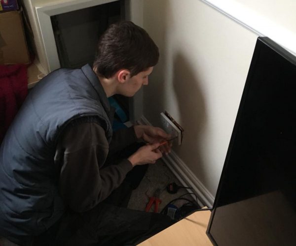 Electrician working on plug socket in a domestic property - Full Circuit Electrical